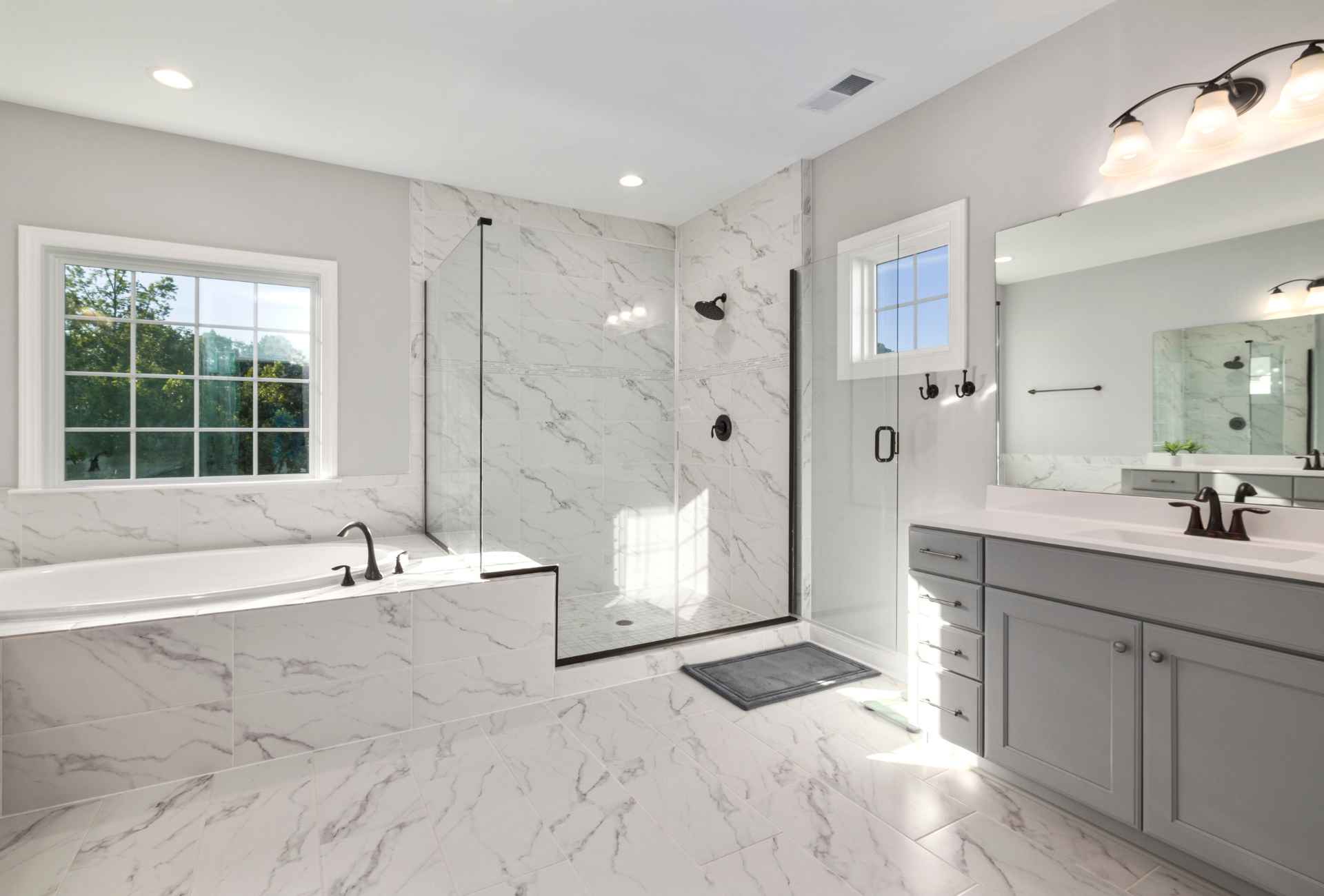 A person is using a smart phone to control a thermostat.